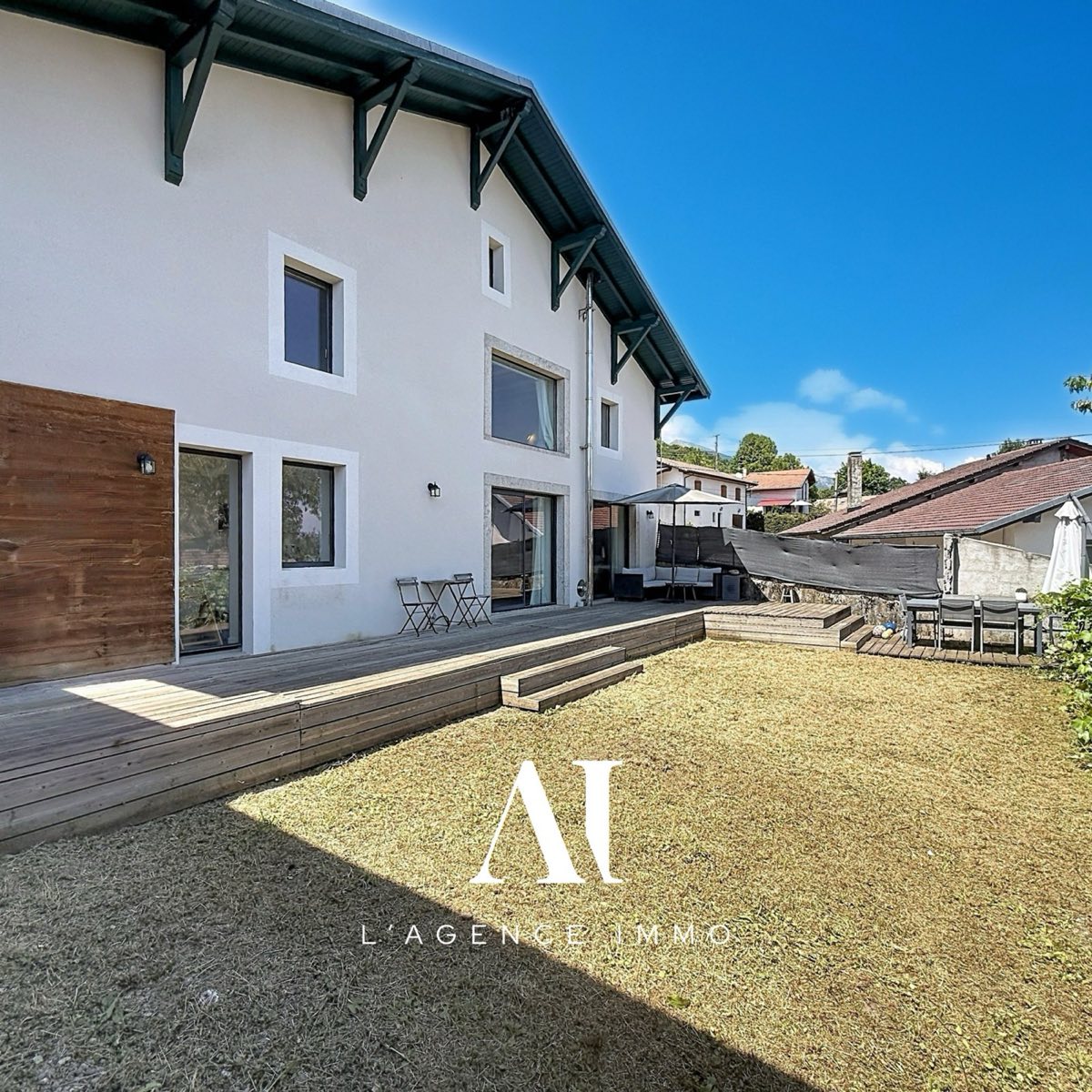 Maison Mitoyenne 1 côté à Péron: vue principale